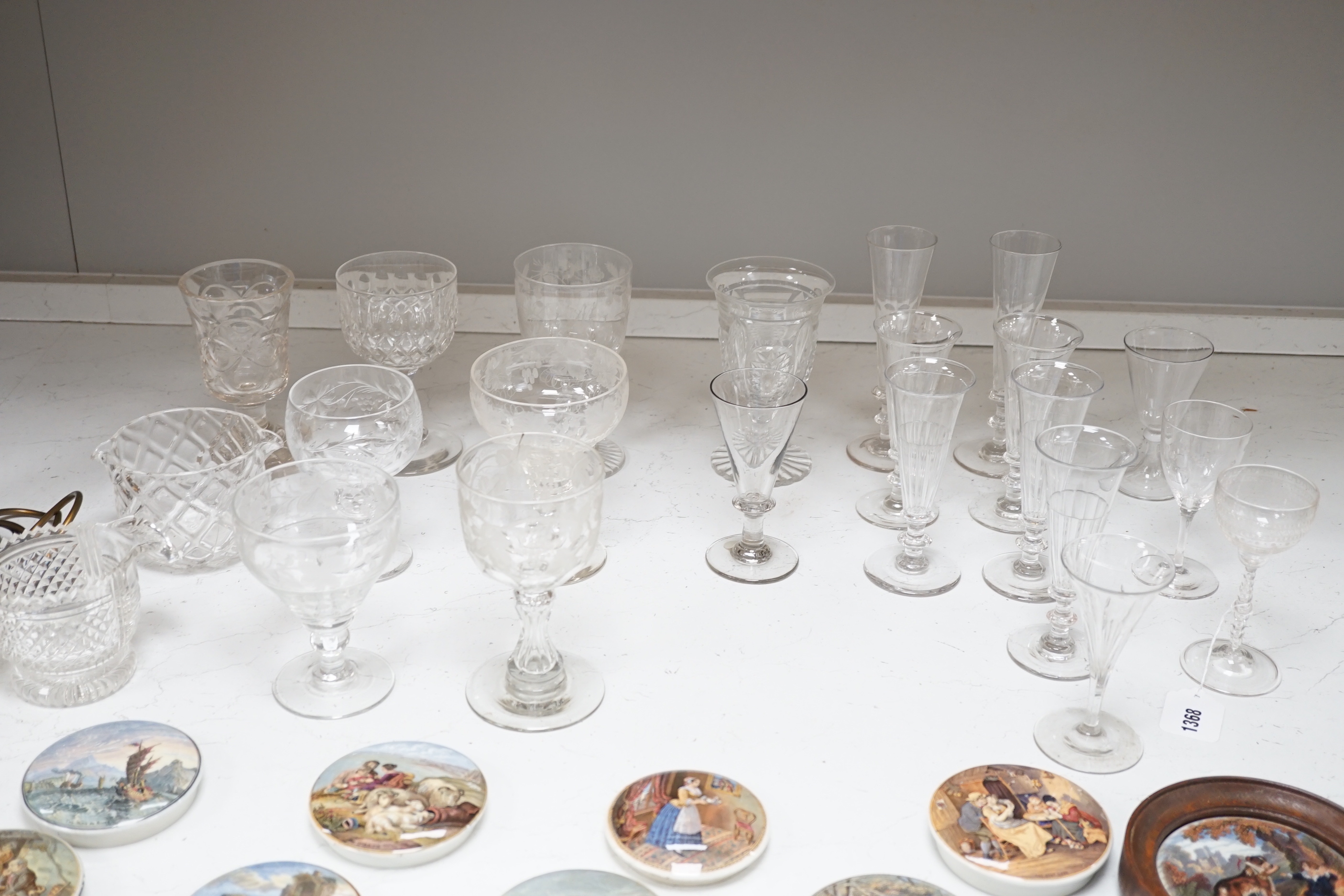 A group of Regency to Edwardian cut drinking glasses, decanters etc including rummers